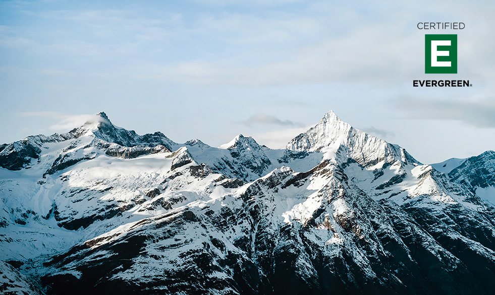 Certified Evergreen logo over mountains